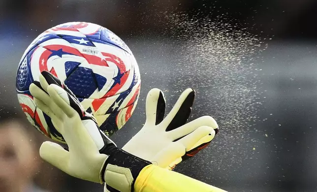 Red Bull Salzburg's Christian Zawieschitzky makes a save during the Club World Cup Group H soccer match between Salzburg and Al Hilal in Washington, Sunday, June 22, 2025. (AP Photo/Nick Wass)