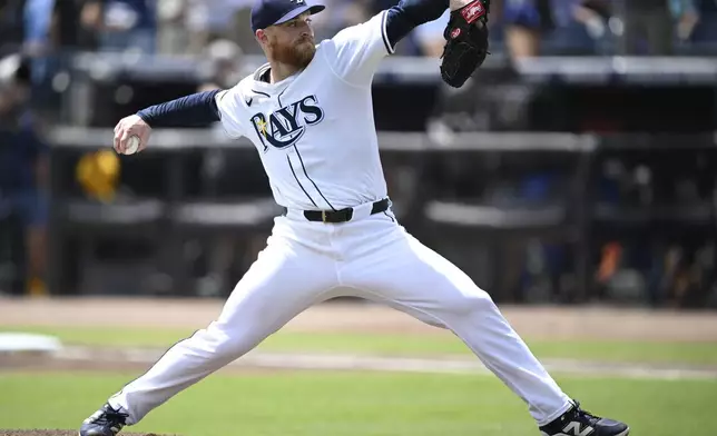 Tampa Bay Rays starting pitcher Drew Rasmussen throws to home plate during the first inning of a baseball game against the Miami Marlins, Sunday, June 8, 2025 in Tampa, Fla. (AP Photo/Phelan M. Ebenhack)