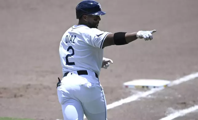Tampa Bay Rays' Yandy Díaz (2) reacts after hitting a two-run home run during the fifth inning of a baseball game against the Miami Marlins, Sunday, June 8, 2025 in Tampa, Fla. (AP Photo/Phelan M. Ebenhack)