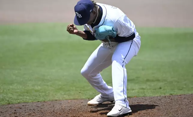 Tampa Bay Rays pitcher Edwin Uceta celebrates after the final out for the 3-2 win against the Miami Marlins in a baseball game, Sunday, June 8, 2025 in Tampa, Fla. (AP Photo/Phelan M. Ebenhack)
