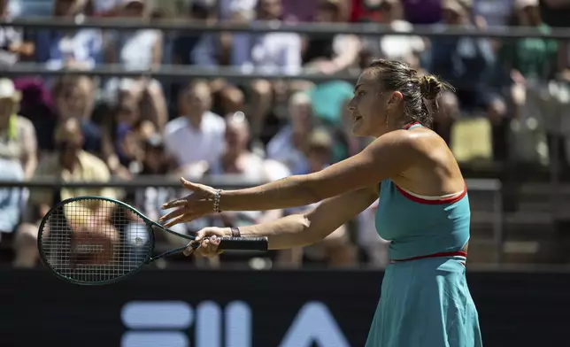Belarus' Aryna Sabalenka reacts during her semifinal match against Czech Republic's Marketa Vondrousova at the Berlin tennis tournament in Berlin, Saturday, June 21, 2025. (Hannes Albert/dpa via AP)