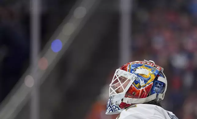 Florida Panthers goalie Sergei Bobrovsky looks on during a stoppage in play during the second period in Game 5 of the NHL hockey Stanley Cup Final against the Edmonton Oilers in Edmonton, Alberta, Saturday, June 14, 2025. (Darryl Dyck/The Canadian Press via AP)