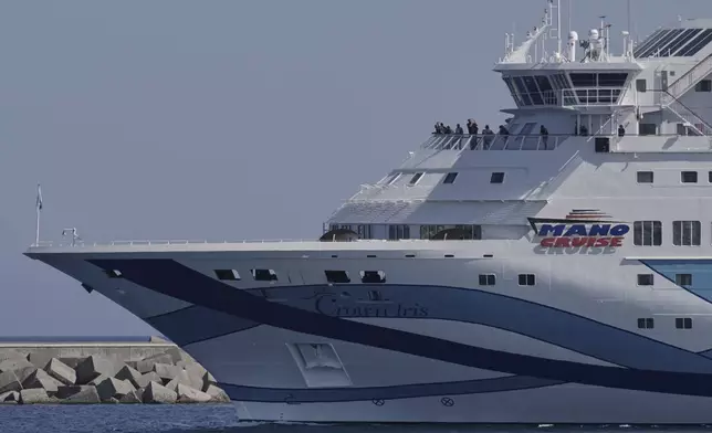 The cruise ship Crown Iris carrying hundreds of stranded Israeli citizens back to Israel departs from Cyprus' main Limassol port on Thursday, June 19, 2025. (AP Photo/Petros Karadjias)