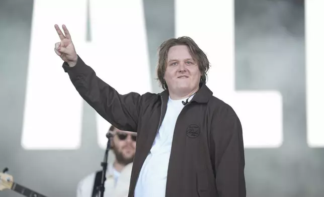 Lewis Capaldi performs during the Glastonbury Festival in Worthy Farm, Somerset, England, Friday, June 27, 2025. (Scott A Garfitt/Invision/AP)