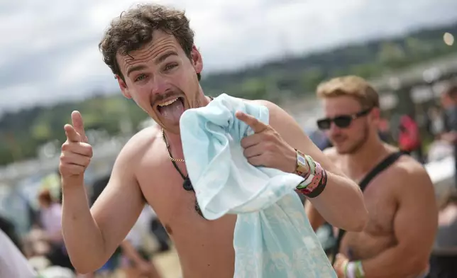Woody Cook arrives at the Glastonbury Festival in Worthy Farm, Somerset, England, Wednesday, June 25, 2025. (Scott A Garfitt/Invision/AP)