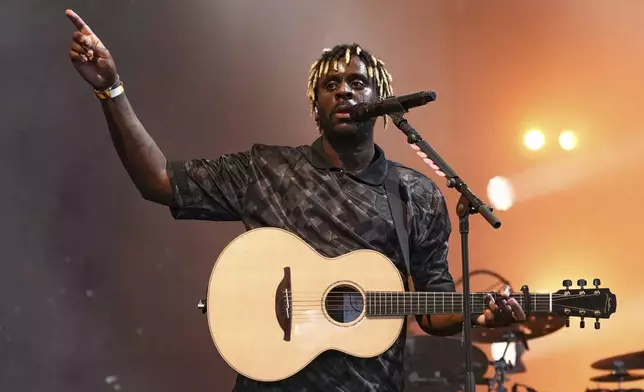 Myles Smith performs during the Glastonbury Festival in Worthy Farm, Somerset, England, Friday, June 27, 2025. (Scott A Garfitt/Invision/AP)