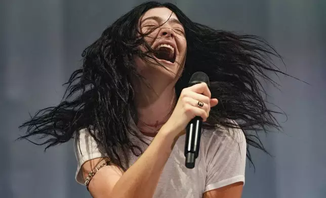 Lorde performs during the Glastonbury Festival in Worthy Farm, Somerset, England, Friday, June 27, 2025. (Scott A Garfitt/Invision/AP)
