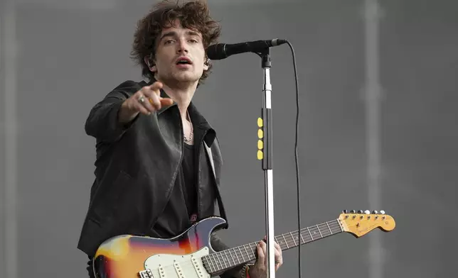 Elijah Hewson of the the rock band Inhaler performs during the Glastonbury Festival in Worthy Farm, Somerset, England, Friday, June 27, 2025. (Scott A Garfitt/Invision/AP)