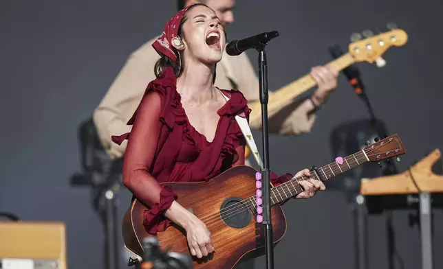 Gracie Abrams performs during the Glastonbury Festival in Worthy Farm, Somerset, England, Friday, June 27, 2025. (Scott A Garfitt/Invision/AP)