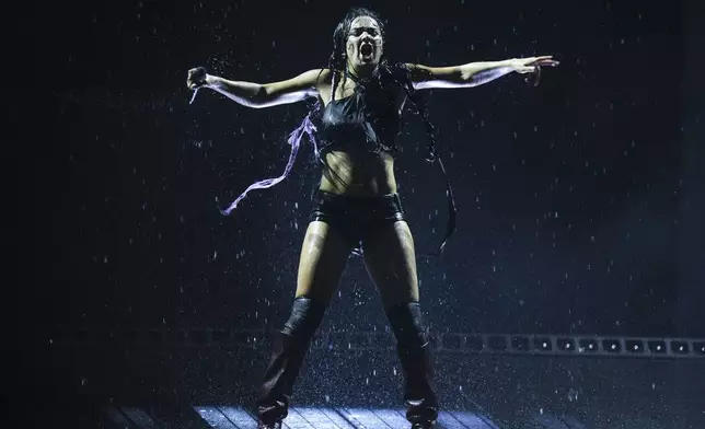 Charli xcx performs during the Glastonbury Festival in Worthy Farm, Somerset, England, Saturday, June 28, 2025. (Scott A Garfitt/Invision/AP)