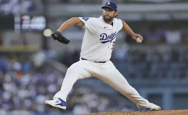 Los Angeles Dodgers pitcher Clayton Kershaw throws to a Washington Nationals batter during the third inning of a baseball game in Los Angeles, Friday, June 20, 2025. (AP Photo/Jessie Alcheh)