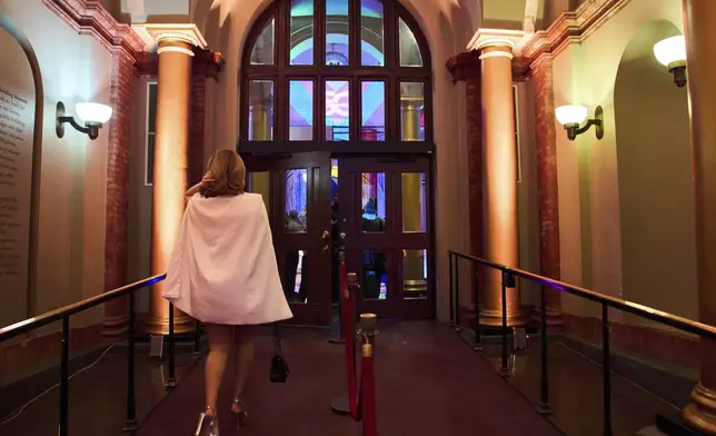 Bella Bautista, 22, a trans woman, arrives for the Capitol Pride Awards, during World Pride, Thursday, June 5, 2025, at the Building Museum in Washington. (AP Photo/Jacquelyn Martin)