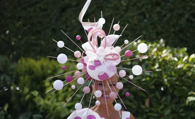 Gill Carpenter wears an ornate hat as she arrives on the second day of the Royal Ascot horse race meeting at Ascot, England, Wednesday, June 18, 2025. (AP Photo/Alberto Pezzali) (AP Photo/Alberto Pezzali)