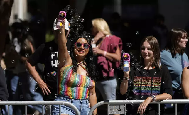 Revelers participate with bubble machines in the Pride Parade, Sunday, June 29, 2025, in San Francisco. (AP Photo/Godofredo A. Vásquez)
