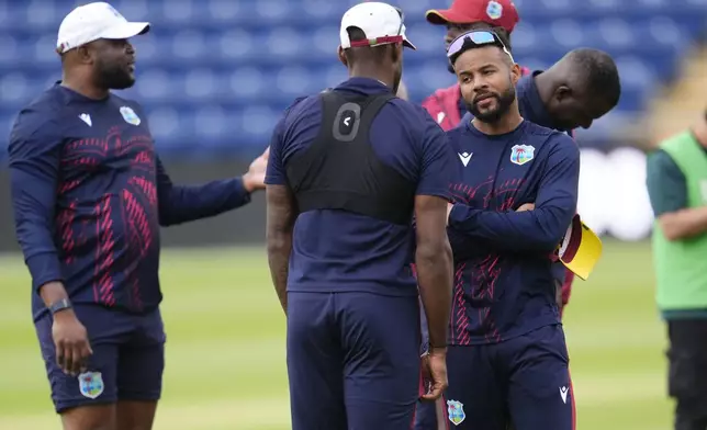 West Indies' Shai Hope, right, attends a nets session at Sophia Gardens, Cardiff, Wales, Saturday May 31, 2025. (Nick Potts/PA via AP)