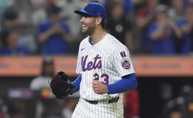 New York Mets pitcher David Peterson (23) celebrates after a baseball game against the Washington Nationals Wednesday, June 11, 2025, in New York. (AP Photo/Frank Franklin II)