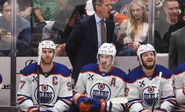 Edmonton Oilers head coach Kris Knoblauch yells from the bench during the first period of Game 5 of the Western Conference finals in the NHL hockey Stanley Cup playoffs against the Dallas Stars, Thursday, May 29, 2025, in Dallas. (AP Photo/Gareth Patterson)