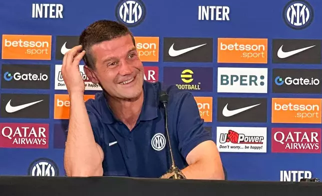 Inter Milan's new coach Cristian Chivu speaks to the media at his introductory soccer news conference in Los Angeles, Saturday, June 14, 2025. (AP Photo/Greg Beacham)