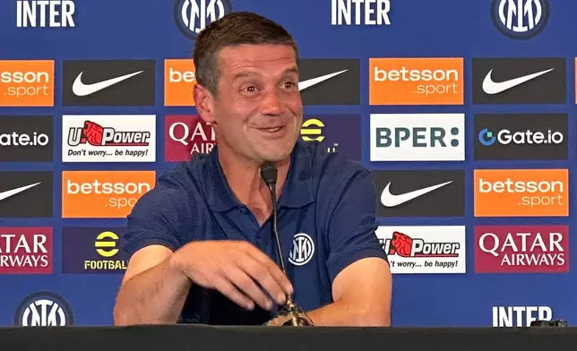 Inter Milan's new coach Cristian Chivu speaks to the media at his introductory soccer news conference in Los Angeles, Saturday, June 14, 2025. (AP Photo/Greg Beacham)