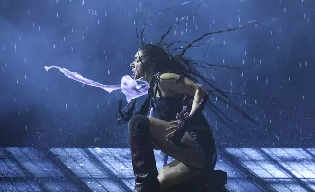 Charli xcx performs during the Glastonbury Festival in Worthy Farm, Somerset, England, Saturday, June 28, 2025. (Scott A Garfitt/Invision/AP)