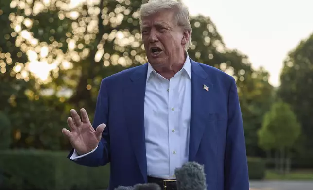 President Donald Trump speaks with reporters before boarding Marine One on the South Lawn of the White House, Tuesday, June 24, 2025, in Washington. (AP Photo/Evan Vucci)