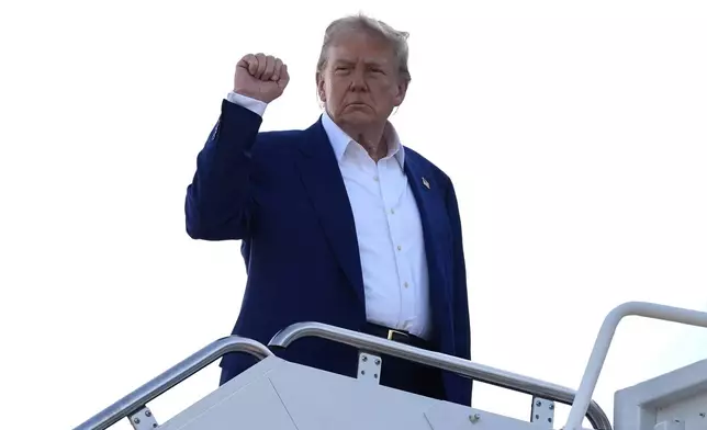 President Donald Trump boards Air Force One, Tuesday, June 24, 2025, at Joint Base Andrews, Md. (AP Photo/Alex Brandon)