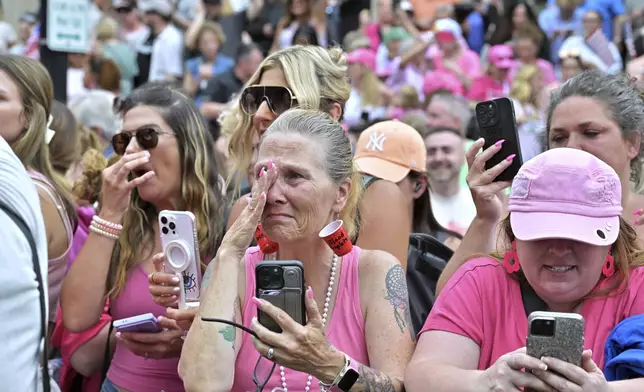 Karen Read suppporters react after she was found not guilty of second-degree murder on Wednesday, June 18, 2025, in Dedham, Mass. (AP Photo/Josh Reynolds)