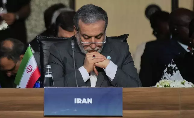 Iranian Foreign Minister Abbas Araghchi listens to speeches as he attends the Council of Foreign Ministers of the Organization of Islamic Cooperation meeting, in Istanbul, Turkey, Saturday, June 21, 2025. (AP Photo/Khalil Hamra)