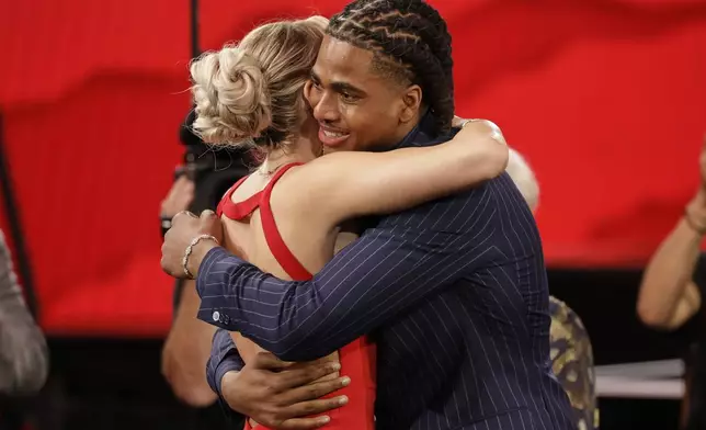 Collin Murray-Boyles reacts after being selected ninth by the Toronto Raptors in the first round of the NBA basketball draft, Wednesday, June 25, 2025, in New York. (AP Photo/Adam Hunger)