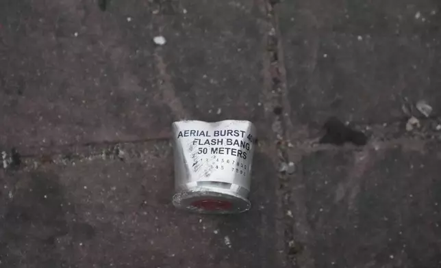 A flash bang canister lies in the street Sunday, June 8, 2025, in Compton, Calif., following an immigration raid protest the night before. (AP Photo/Jae Hong)
