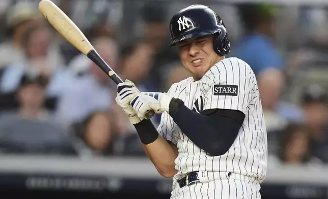 New York Yankees' Anthony Volpe reacts as he is hit by a pitch during the second inning of a baseball game against the Boston Red Sox, Friday, June 6, 2025, in New York. (AP Photo/Frank Franklin II)