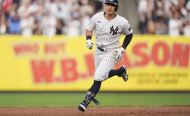 New York Yankees' Anthony Volpe runs the bases after hitting a two-run home run during the first inning of a baseball game against the Boston Red Sox, Friday, June 6, 2025, in New York. (AP Photo/Frank Franklin II)