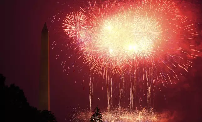 Fireworks burst over the Ellipse during an event to honor the Army's 250th anniversary, coinciding with President Donald Trump's 79th birthday, Saturday, June 14, 2025, in Washington. (AP Photo/Mark Schiefelbein)