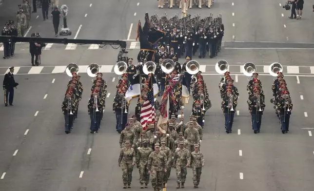 A military parade commemorating the Army's 250th anniversary and coinciding with President Donald Trump's 79th birthday, Saturday, June 14, 2025, in Washington. (AP Photo/Jacquelyn Martin)