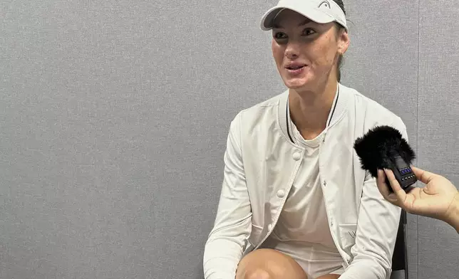 Carson Branstine, a tennis player who went to Texas A&amp;M University and represents Canada, speaks to reporters at the All England Club in Wimbledon, London, Saturday, June 28, 2025. (AP Photo/Howard Fendrich)