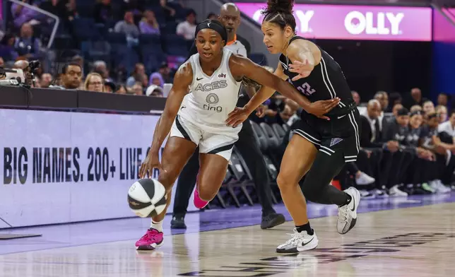 Golden State Valkyries guard Veronica Burton (22) guards against Las Vegas Aces guard Jackie Young (0) during the first half a WNBA basketball game, Saturday, June 7, 2025, at Chase Center in San Francisco, Calif. (Yalonda M. James/San Francisco Chronicle via AP)