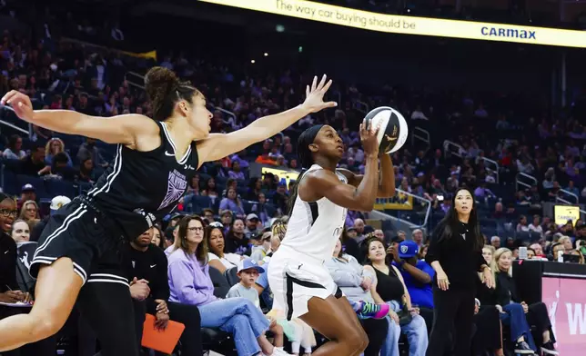 Golden State Valkyries guard Veronica Burton (22) guards against Las Vegas Aces guard Jackie Young (0) in the first half at Chase Center in San Francisco, Calif. on Saturday, June 7, 2025. (Yalonda M. James/San Francisco Chronicle via AP)