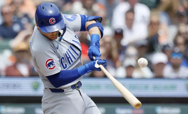 Chicago Cubs' Nico Hoerner flies out against the Detroit Tigers during the third inning of a baseball game Sunday, June 8, 2025, in Detroit. (AP Photo/Duane Burleson)