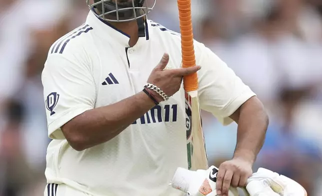 India's Rishabh Pant walks off the field after losing his wicket on day two of the first cricket test match between England and India at Headingley in Leeds, England, Saturday, June 21, 2025, (AP Photo/Scott Heppell)