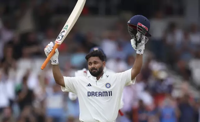 India's Rishabh Pant celebrates after scoring a century on day two of the first cricket test match between England and India at Headingley in Leeds, England, Saturday, June 21, 2025, (AP Photo/Scott Heppell)