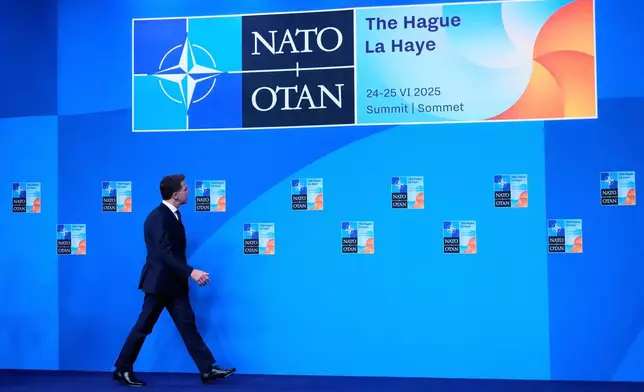 NATO Secretary General Mark Rutte tours the venue site ahead of the upcoming NATO summit in The Hague, Netherlands, Monday, June 23, 2025. (AP Photo/Matthias Schrader)