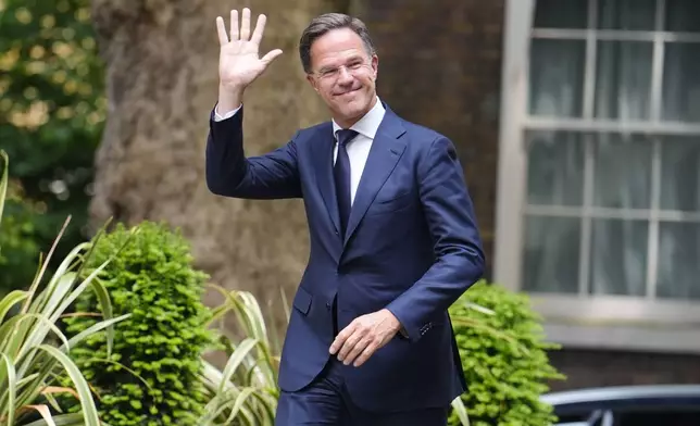 Nato Secretary General Mark Rutte arrives for his meeting with Britain's Prime Minister Sir Keir Starmer at 10 Downing Street in London, Monday, June 9, 2025. (Jordan Pettitt/PA via AP)