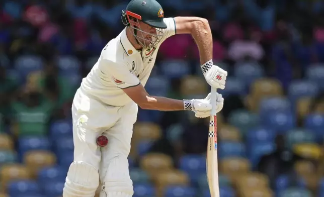 Australia's Beau Webster plays a shot against West Indies on day three of the first cricket Test match at Kensington Stadium in Bridgetown, Barbados, Friday, June 27, 2025. (AP Photo/Ricardo Mazalan)