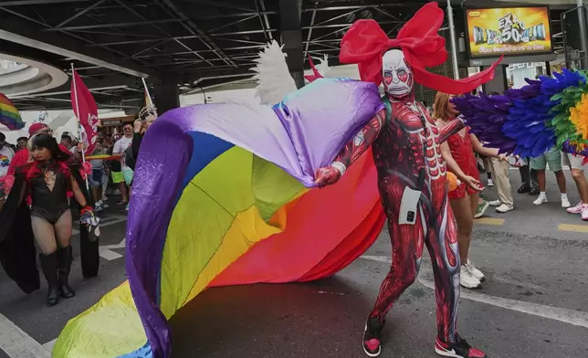 A participant takes part in the annual Pride Parade to celebrate the LGBTQ+ community’s Pride Month in Bangkok, Thailand, Sunday, June 1, 2025. (AP Photo/Sakchai Lalit)