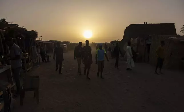 Night falls on the Adre, Chad, transit camp, Tuesday, May 6, 2025. (AP Photo/Caitlin Kelly)