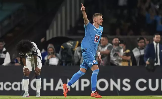 Mateusz Bogusz of Mexico's Cruz Azul celebrates scoring his side's 4th goal against Canada's Vancouver Whitecaps during the CONCACAF Champions Cup final soccer match in Mexico City, Sunday, June 1, 2025. (AP Photo/Fernando Llano)