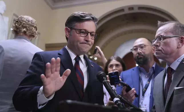 Speaker of the House Mike Johnson, R-La., reacts to reporters after Sen. Alex Padilla, D-Calif., was forcefully removed from Homeland Security Secretary Kristi Noem's news conference in Los Angeles and handcuffed by officers as he tried to speak up about immigration raids that have led to protests in California and elsewhere, at the Capitol in Washington, Thursday, June 12, 2025. (AP Photo/J. Scott Applewhite)
