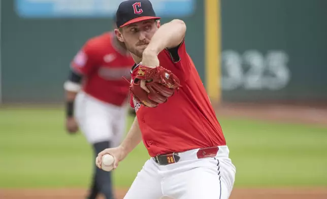 Cleveland Guardians starting pitcher Tanner Bibee delivers against the Houston Astros during the first inning of a baseball game, Sunday June 8, 2025, in Cleveland. (AP Photo/Phil Long)