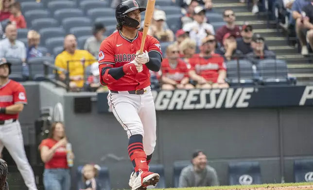 Cleveland Guardians' Bo Naylor watches his two-run home run off Houston Astros starting pitcher Brandon Walter during the second inning of a baseball game, Sunday June 8, 2025, in Cleveland. (AP Photo/Phil Long)