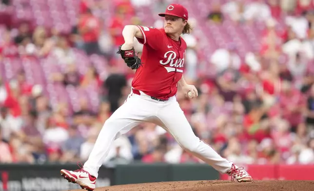 Cincinnati Reds pitcher Andrew Abbott throws during the second inning of a baseball game against the Minnesota Twins, Tuesday, June 17, 2025, in Cincinnati. (AP Photo/Jeff Dean)
